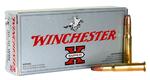 A box of winchester .308 caliber ammunition with one cartridge placed in front of it.