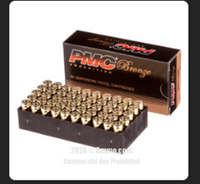 A box of pmc bronze 9mm pistol cartridges, partially opened to show rows of bullets.